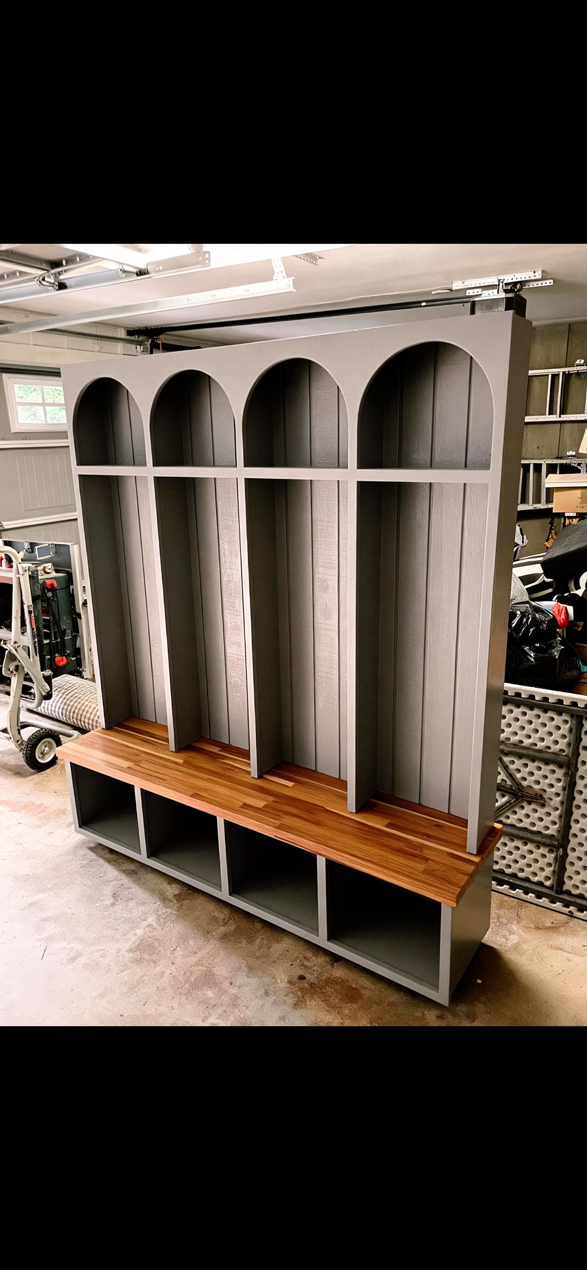 Custom arched hall tree with bench seating, built by Bradley Mitchell in Macon, GA